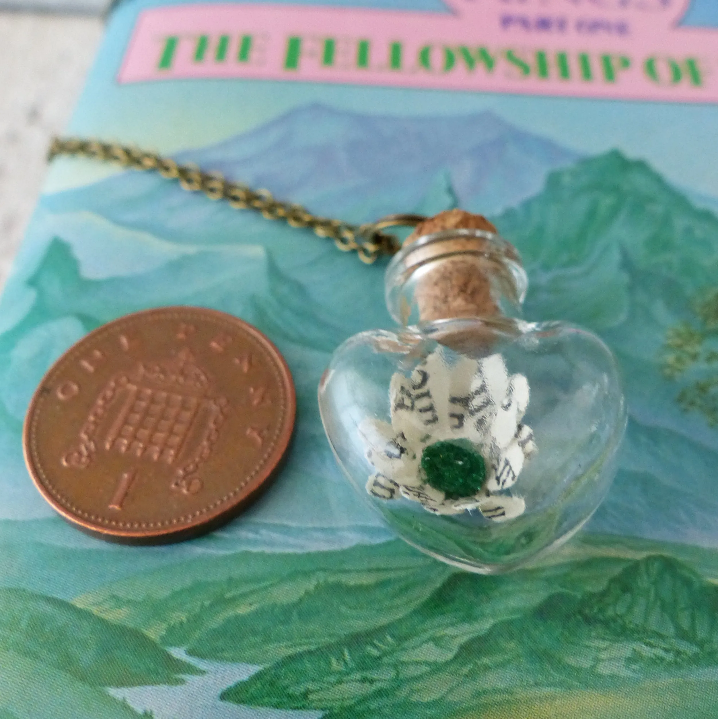 LOTR daisy in heart bottle necklace