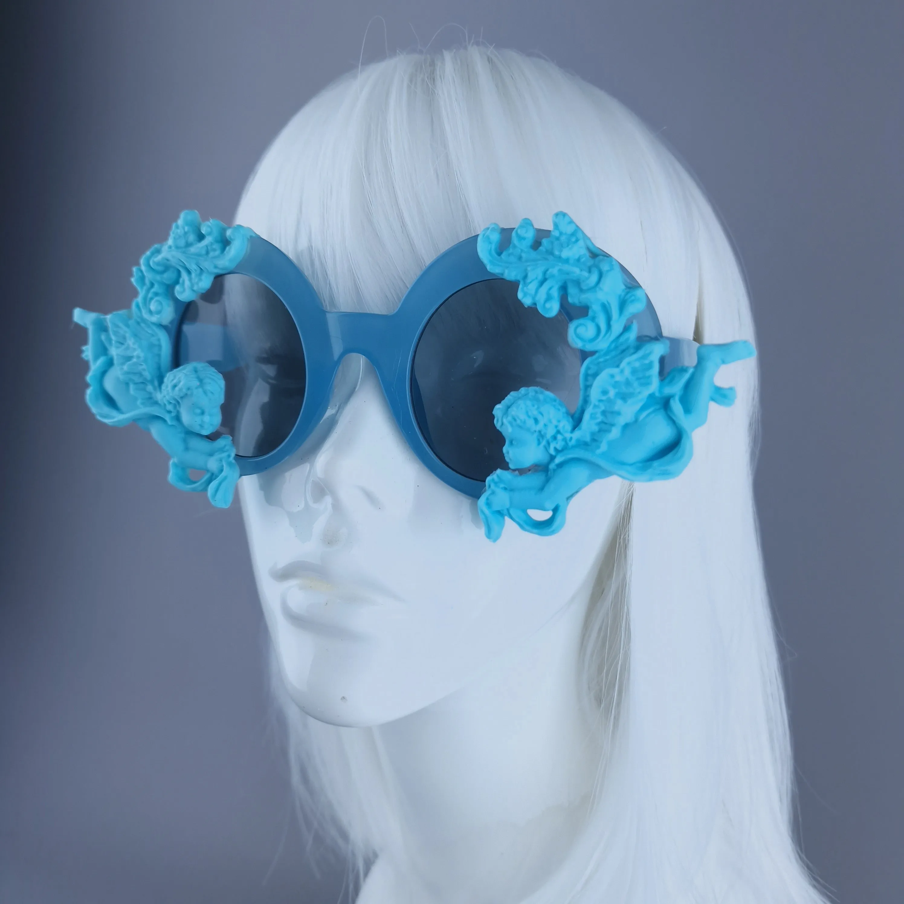 "Nesta" Round Pastel Blue Filigree & Cherub Sunglasses