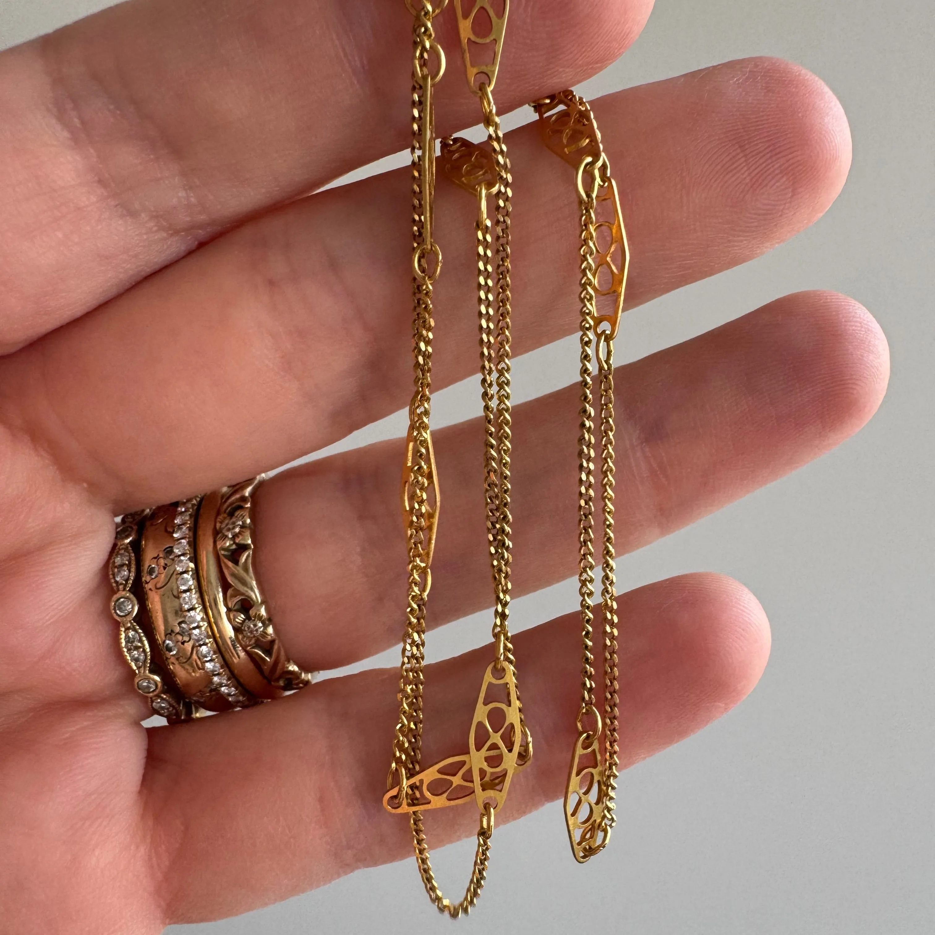 V I N T A G E // deco infinity / 14k yellow gold filigree and curb station chain necklace / just shy of 18.25", 2.2g